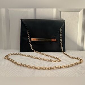 Elegant Black Clutch with Gold Chain and wallet